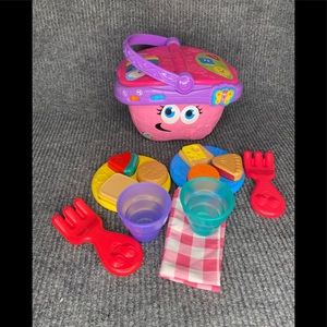 Leap Frog pink picnic basket food forks plates shapes colors talks music